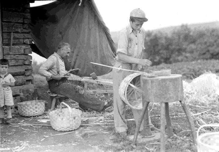 Man and son making baskets
